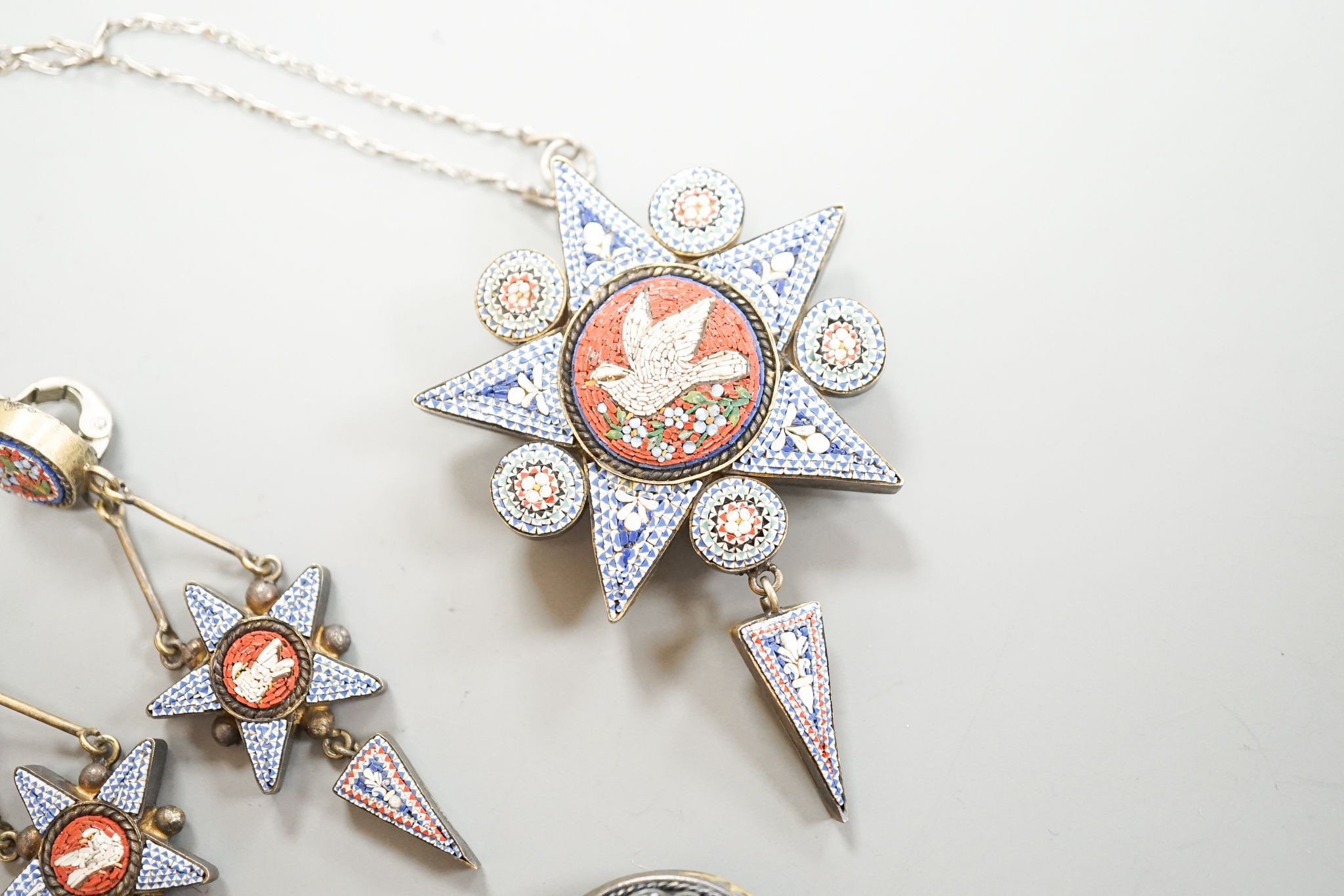 A 19th century Italian gilt metal and micro-mosaic drop pendant on chain, pendant 6cm and a pair of matching drop earrings and a micro-mosaic button
